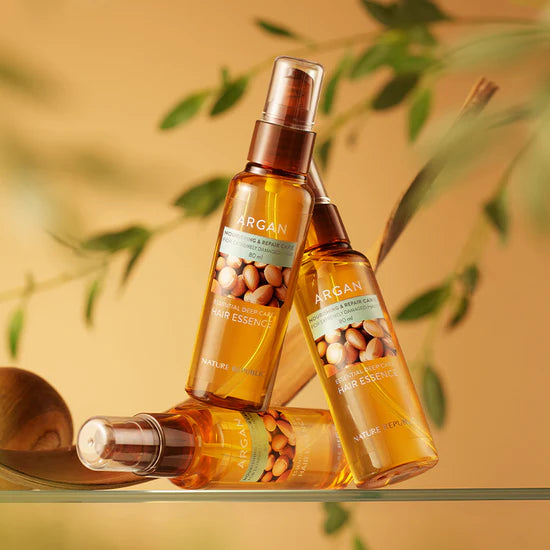 Nature Republic Argan Essential Deep Care Hair Essence – An intensive hair treatment enriched with highly concentrated argan oil, rosehip oil, and evening primrose oil to repair and nourish damaged hair.