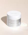 Mary & May Vitamin B C E Cleansing Balm – A 120g jar of soft, non-flowing cleansing balm enriched with Vitamins C, B, and E, designed to gently remove makeup, oil, and blackheads while brightening and hydrating the skin.