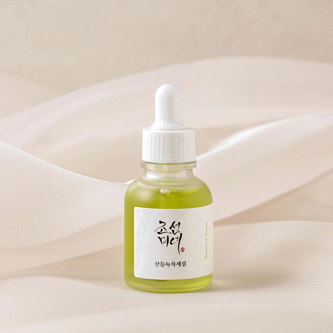 Beauty of Joseon Calming Serum Green Tea + Panthenol 30ml, a soothing serum with 50% Green Tea, 30% Mugwort, and 5% Panthenol designed to hydrate, calm sensitive skin, and protect against UV damage