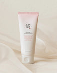 The Beauty of Joseon Apricot Blossom Peeling Gel 100ml, a gentle gommage exfoliator with 19% Prunus Mume Flower Water, designed to exfoliate, hydrate, and smooth the skin on both face and body