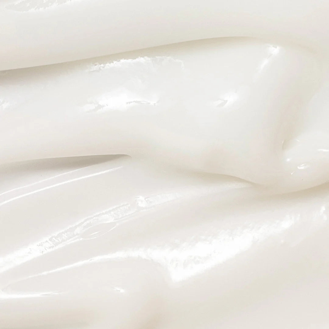 Close-up of The Beauty of Joseon Dynasty Cream showing its rich, firm texture that absorbs quickly, leaving the skin soft, moisturized, and revitalized without a greasy residue.