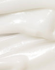 Close-up of The Beauty of Joseon Dynasty Cream showing its rich, firm texture that absorbs quickly, leaving the skin soft, moisturized, and revitalized without a greasy residue.