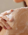 Some By Mi AHA BHA PHA Miracle Acne Body Cleanser – Using the cleanser on body skin, exfoliating and calming acne with Truecica™ and salicylic acid for smoother, clearer skin.