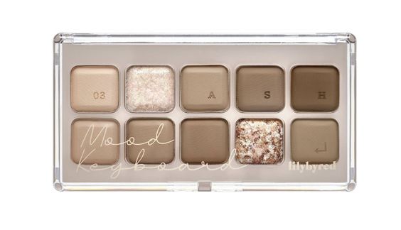 Lilybyred Mood Keyboard – 10-shade eye shadow palette with a mix of matte, shimmer, and glitter textures for creating bold, sassy eye makeup looks.
