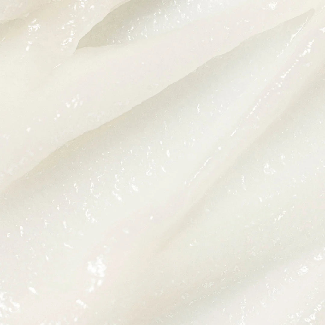 Model gently massaging The Beauty of Joseon Apricot Blossom Peeling Gel onto dry skin, showing how it exfoliates and smooths the skin with its non-abrasive, refreshing formula.