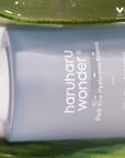 Haruharu Wonder Black Rice Hyaluronic Essence showcasing its lightweight texture and non-greasy formula