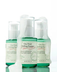 Close-up of AXIS-Y Vita Frost Chilling Essence showing small white capsules in the lightweight, airy texture, designed to cool and calm irritated skin