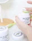 Close-up of Secret Key Snow White Cream texture – Smooth, creamy formula that hydrates and brightens the skin.