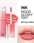 Peripera Ink Mood Glowy Tint being applied directly to the lips, starting from the center and blending outward for a smooth, even finish, highlighting its non-sticky, moisturizing texture.