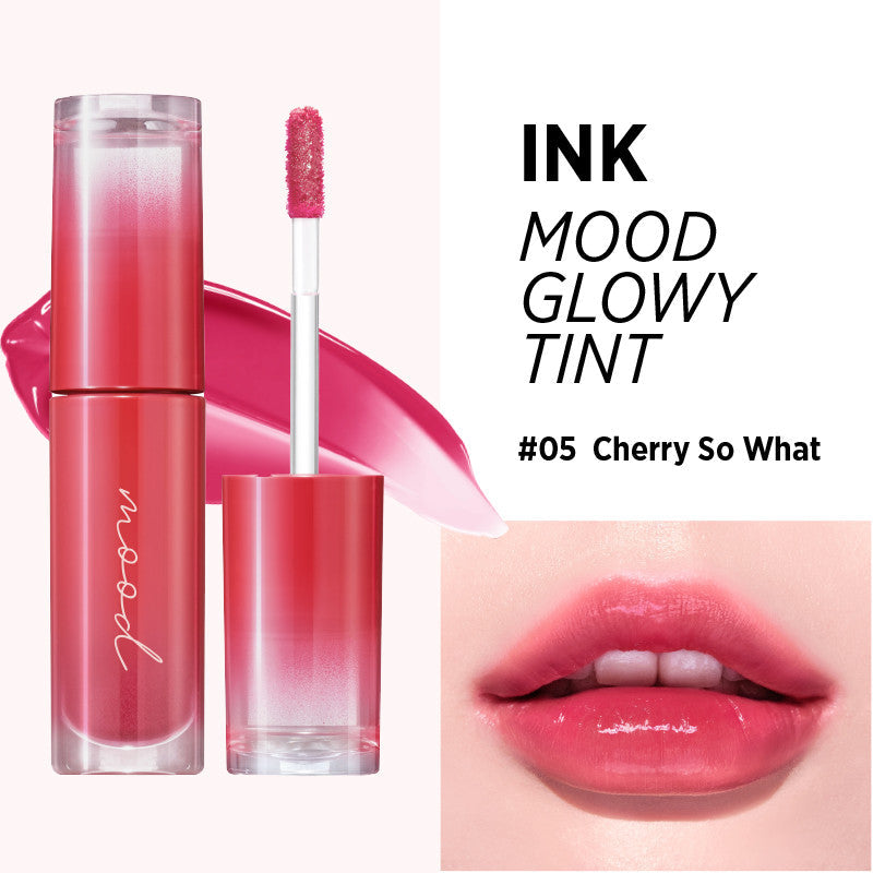 Peripera Ink Mood Glowy Tint being applied directly to the lips, starting from the center and blending outward for a smooth, even finish, highlighting its non-sticky, moisturizing texture.