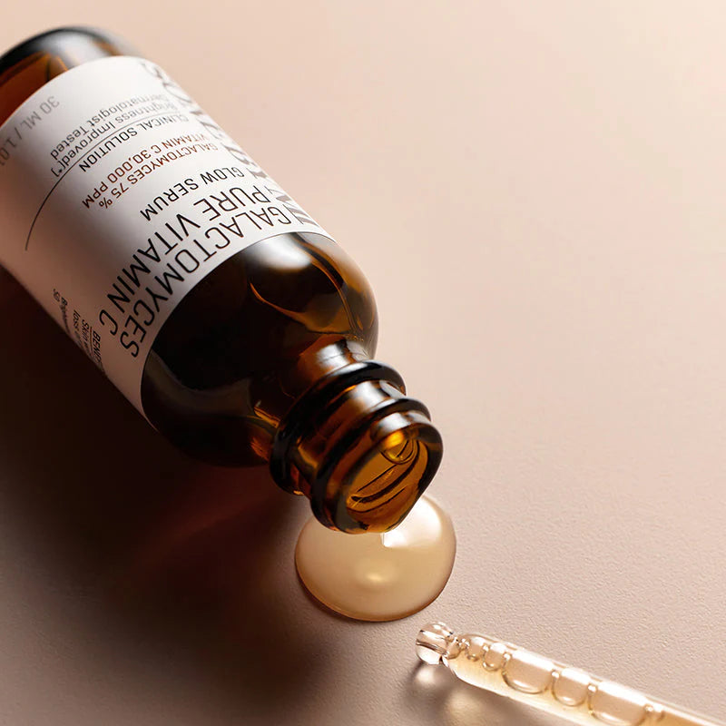 Some By Mi Galactomyces Pure Vitamin C Glow Serum – A droplet of serum showcasing its lightweight formula to brighten and smooth skin, reducing dark spots and promoting radiance.