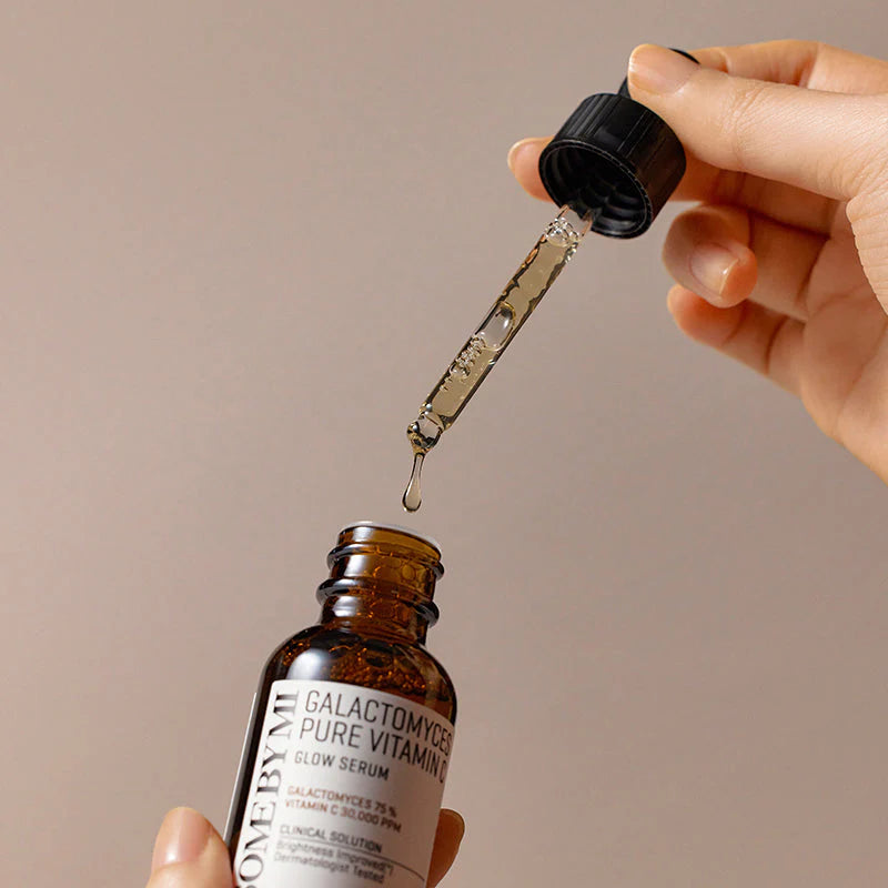Some By Mi Galactomyces Pure Vitamin C Glow Serum – A droplet of serum showcasing its lightweight formula to brighten and smooth skin, reducing dark spots and promoting radiance.