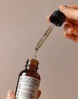 Some By Mi Galactomyces Pure Vitamin C Glow Serum – A droplet of serum showcasing its lightweight formula to brighten and smooth skin, reducing dark spots and promoting radiance.