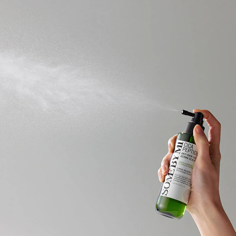 Some By Mi Cica Peptide Anti Hair Loss Derma Scalp Tonic – Applying the lightweight tonic directly onto the scalp to improve scalp health and reduce hair loss.