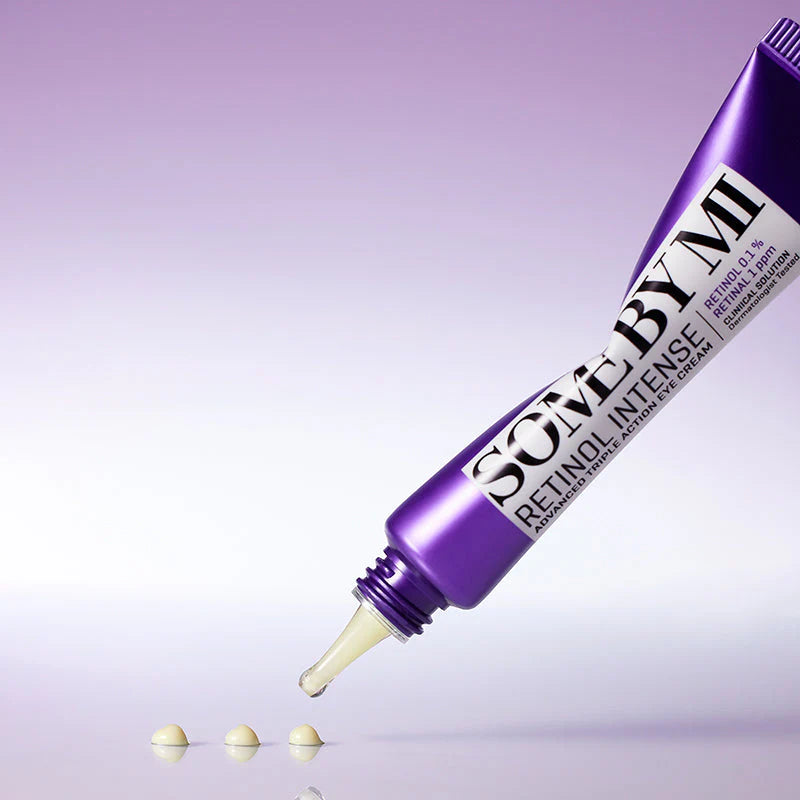 Some By Mi Retinol Intense Advanced Triple Action Eye Cream – Close-up of the rich, smooth texture of the eye cream being gently applied around the delicate eye area.