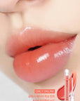 Close-up of lips with Lilybyred Glassy Layer Fixing Tint – Shows the glossy finish and vivid color in shades like Muscat Shower, Kill Me Plum, and Berry Kitsch.