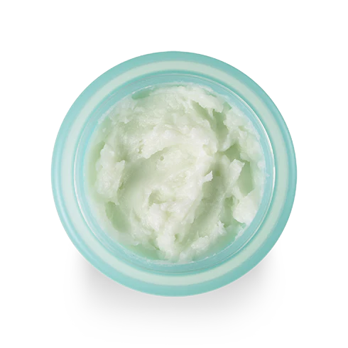 Model using Banila Co Clean It Zero Cleansing Balm Revitalizing, massaging the balm onto dry skin to melt away makeup, dirt, and impurities while delivering antioxidants and hydration.