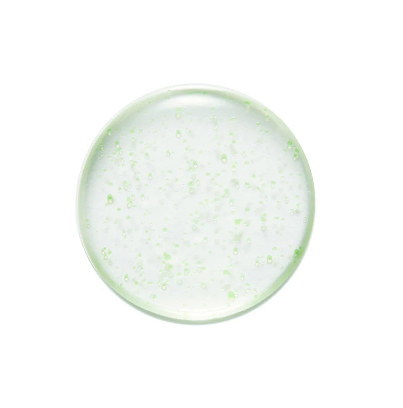 Close-up shot of the light, watery texture of the Nature Republic Real Squeeze Aloe Vera Essence being dispensed, showing its smooth consistency.