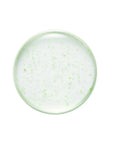 Close-up shot of the light, watery texture of the Nature Republic Real Squeeze Aloe Vera Essence being dispensed, showing its smooth consistency.