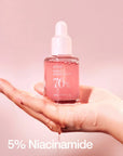 Anua Peach Niacinamide Serum with 70% peach extract and 5% niacinamide for brightening and hydration