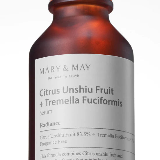 Close-up of the active ingredients, Citrus Unshiu Fruit Extract and Tremella Fuciformis Extract, illustrating their brightening and hydrating effects on the skin.