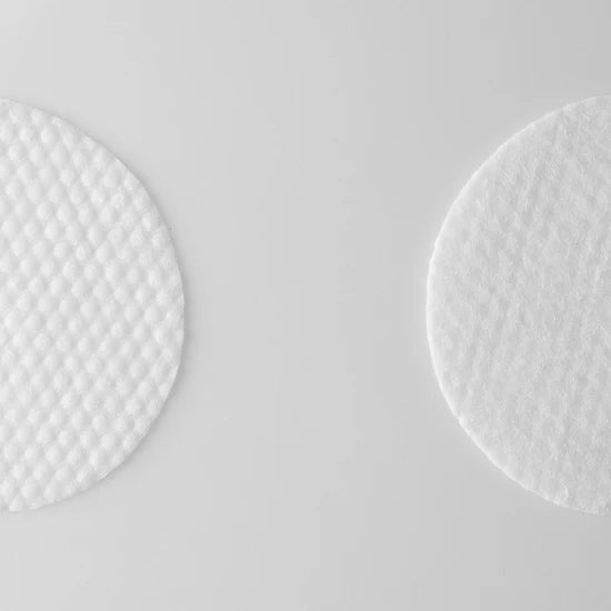 Close-up of a Mary & May Gluconolactone PHA + Betula Alba Juice Cleansing Pad – The textured side of the pad for gentle exfoliation, with a smooth side for soothing hydration.