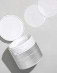 Close-up of a Mary & May Gluconolactone PHA + Betula Alba Juice Cleansing Pad – The textured side of the pad for gentle exfoliation, with a smooth side for soothing hydration.