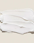 Close-up of the smooth, creamy texture of Mary & May Tranexamic Acid + Glutathione Eye Cream – Lightweight yet effective, designed to absorb quickly without feeling heavy or greasy on the delicate eye area.