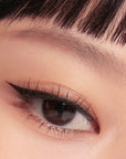 Before and after applying the Peripera Speedy Eyebrow Auto Pencil, showing how the pencil fills in sparse brows and enhances the overall shape, resulting in fuller, more defined brows.
