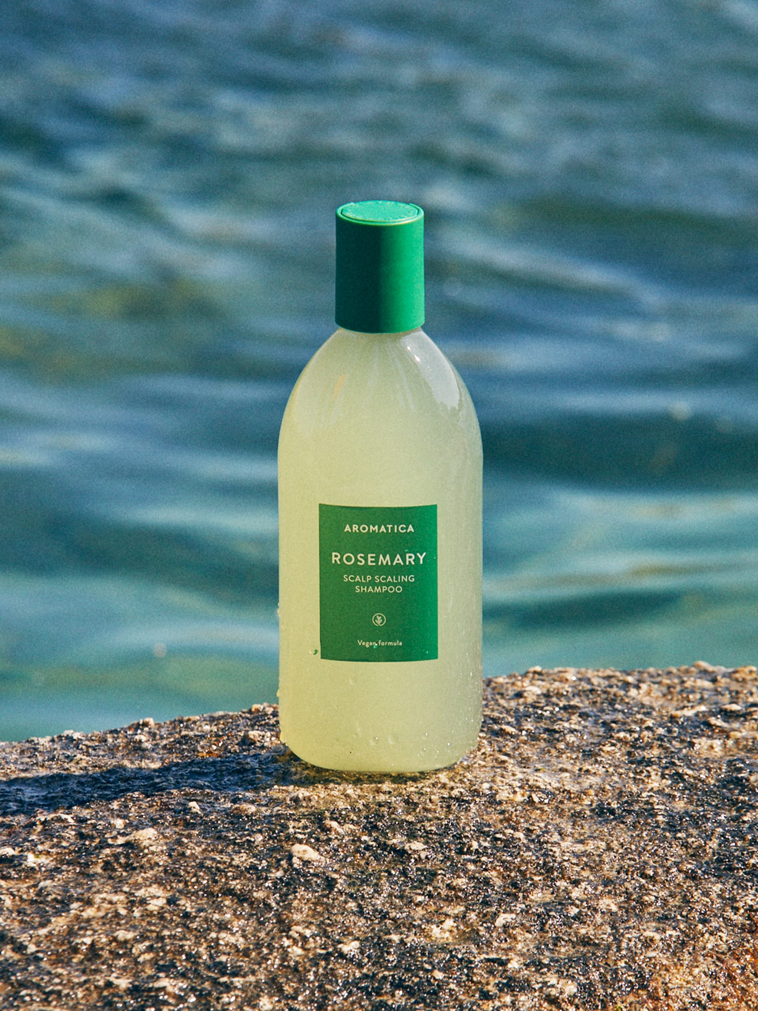 Aromatica Rosemary Scalp Scaling Shampoo with biotin and amino acids strengthens hair from the root to tip for healthier, stronger hair