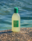 Aromatica Rosemary Scalp Scaling Shampoo with biotin and amino acids strengthens hair from the root to tip for healthier, stronger hair