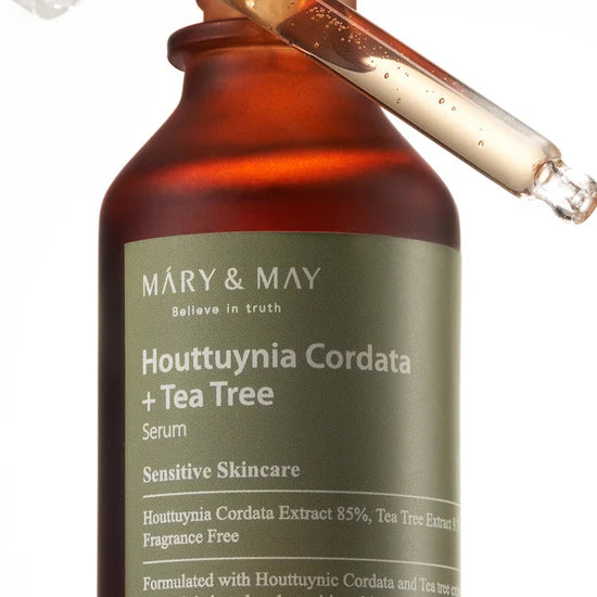 Close-up of key ingredients: Houttuynia Cordata Extract and Tea Tree Extract – Focused on their soothing and anti-inflammatory properties to reduce irritation and fight acne.