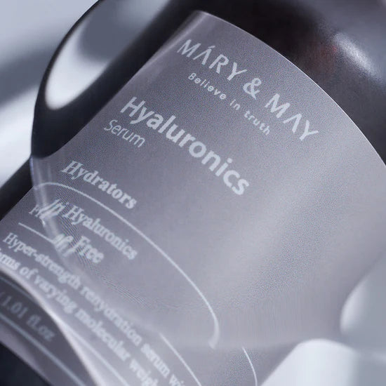 Close-up of Mary & May Multi Hyaluronic Serum packaging – Highlighting the sleek bottle design and emphasizing the six types of hyaluronic acid that lock in hydration and promote smooth, hydrated skin.