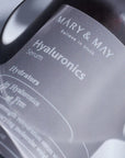 Close-up of Mary & May Multi Hyaluronic Serum packaging – Highlighting the sleek bottle design and emphasizing the six types of hyaluronic acid that lock in hydration and promote smooth, hydrated skin.