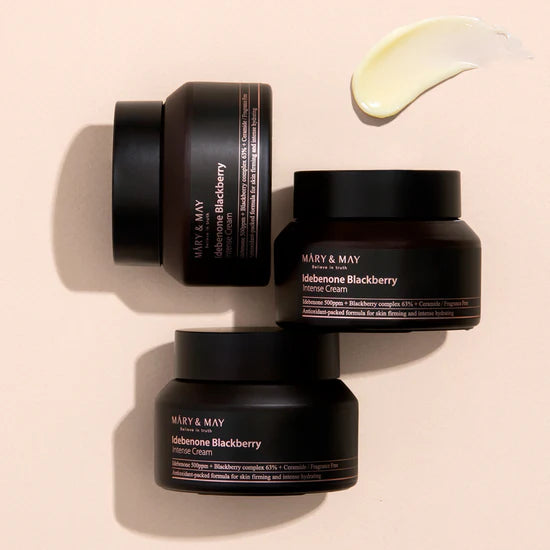 Close-up of Mary & May Idebenone + Blackberry Complex Intensive Total Care Cream packaging – Showing the sleek jar with the label highlighting its nourishing and antioxidant-rich formula for skin protection.