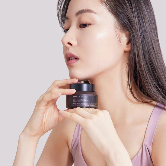 Mary & May Idebenone + Blackberry Complex Intensive Total Care Cream – A 70ml jar of rich cream designed to provide hydration, firmness, and anti-aging benefits with antioxidants and moisturizing ingredients.