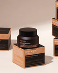 Mary & May Idebenone + Blackberry Complex Intensive Total Care Cream – A 70ml jar of rich cream designed to provide hydration, firmness, and anti-aging benefits with antioxidants and moisturizing ingredients.