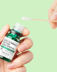 Close-up of Some By Mi Tea Tree Clear Spot Oil – Lightweight, fast-absorbing oil with a smooth, non-greasy texture for acne treatment.