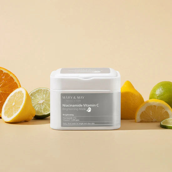 Close-up of ingredients in Mary & May Niacinamide Vitamin C Brightening Mask – Featuring Niacinamide, Vitamin C, six types of Hyaluronic Acid, and other skin-nourishing ingredients.