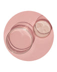 Neogen A Clear Soothing Pink Eraser bottle with visible pink sediment at the bottom, highlighting the soothing and acne-fighting properties of the treatment.
