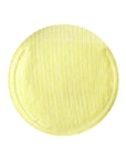 Close-up of a cotton gauze pad soaked in lemon serum, demonstrating its exfoliating texture while effectively removing dead skin cells and impurities.