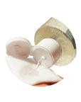 Close-up of the cleansing water being dispensed onto a cotton pad, demonstrating its lightweight, clear formula that hydrates while effectively removing makeup and impurities.