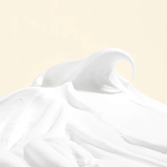 Demonstrating the application of Mary & May White Collagen Cleansing Foam – Foam being massaged onto the face to remove makeup, dirt, and impurities while leaving skin soft and hydrated.