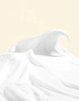 Demonstrating the application of Mary & May White Collagen Cleansing Foam – Foam being massaged onto the face to remove makeup, dirt, and impurities while leaving skin soft and hydrated.