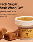 Skinfood Black Sugar Mask Wash Off – Jar containing exfoliating mask with nourishing ingredients to leave skin soft, clean, and glowing.
