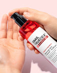 Some By Mi Snail Truecica Miracle Repair Toner – Close-up of the toner being applied with a cotton pad, showing its smooth and hydrating formula for repairing damaged skin.
